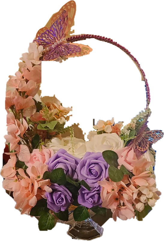 Hoop centerpiece with blush hydrangeas, lavender roses, and pearl-studded butterflies