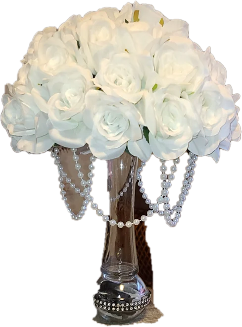 Tall vase of white roses draped with strands of pearls